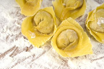 flouring tortellini ready to cook in the broth