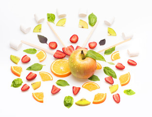 green mint leaves, apple and orange dessert isolated on white