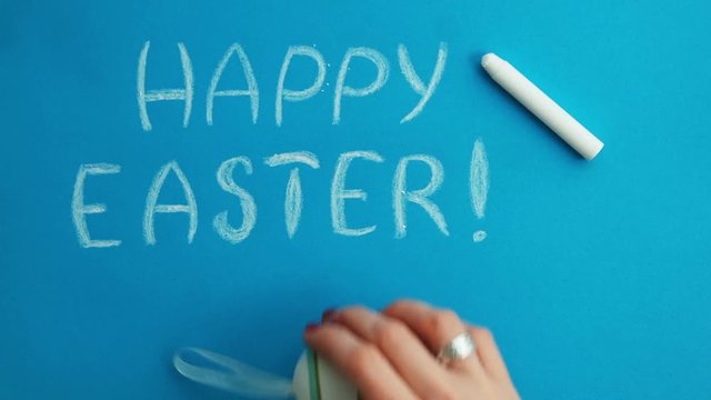 Happy Easter - written with chalk. Time Lapse.