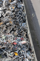 Heaps of Sorted Material in a Recycling Facility
