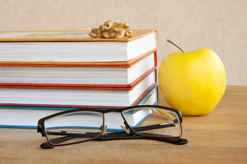 Reading. Books, Glasses and Apple