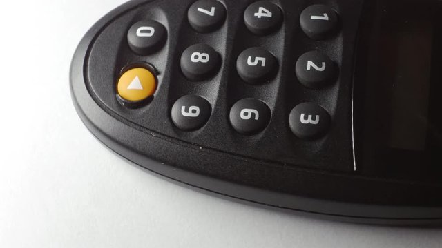 Internet Banking secure pin generator turning on a white background, close-up