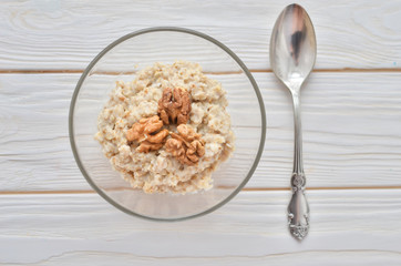 Healthy eating right.  Oatmeal with walnuts