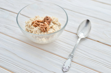 Healthy eating right.  Oatmeal with walnuts