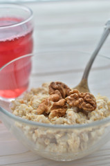 Healthy eating right.  Oatmeal with walnuts