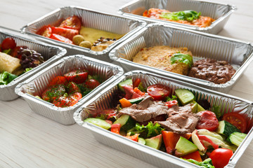 Healthy food in boxes, diet concept.