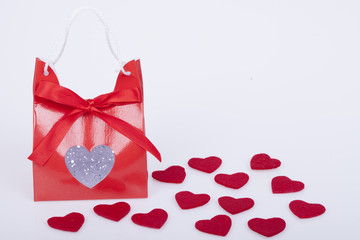 Gift for Valentines day and red hearts