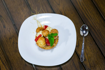 delicious dessert on the plate with mint leaf