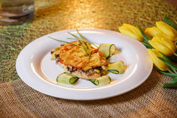 baked chicken cutlet with cheese and mushrooms