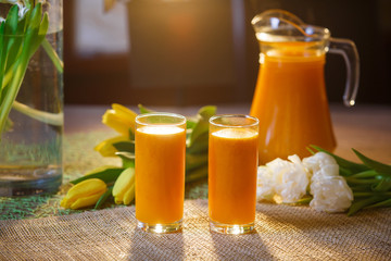 fresh drink, juice, sea buckthorn, orange in transparent glasses