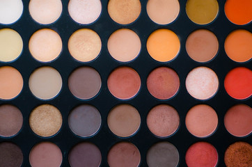 Close up of a makeup cosmetic palette for a woman with different colors