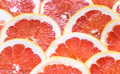 Close up of sliced grapefruit as a background.