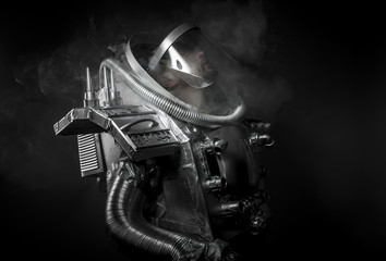 Space man, astronaut dressed in silver or metalized space suit.