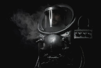 Space man, astronaut dressed in silver or metalized space suit.