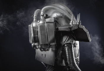 Space man, astronaut dressed in silver or metalized space suit.