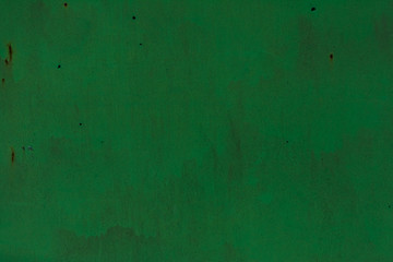Texture painted metal surface. Green horizontal background.