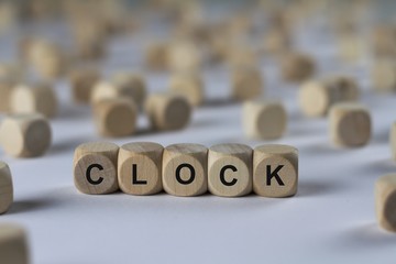 clock - cube with letters, sign with wooden cubes