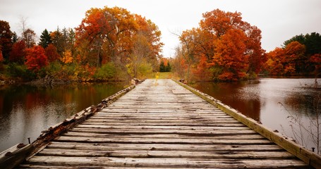 Fototapeta na wymiar Wooden Autumn Bridge