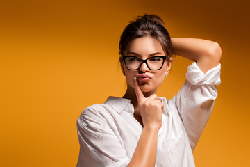 Young emotional beautiful girl posing