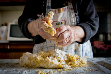 old italian lady's making home made italian pasta