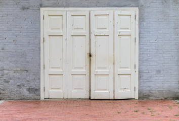 Gray brick wall with door