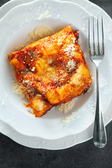 Lasagne with cheese layered between sheets of traditional Italia