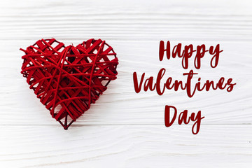 happy valentine day text sign.stylish red heart  flat lay on whi