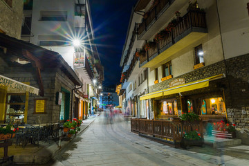 Summer night in Courmayeur, Italy just after a rain storm - obrazy, fototapety, plakaty