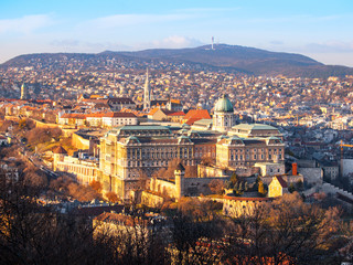 View of Buda Castle from Gellert Hill on sunny evening, Budapest, Hungary, Europe, UNESCO World Heritage Site.