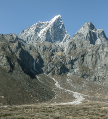 The Tabuche (6367 m) peak on background, view from Periche village - Everest region, Nepal,...