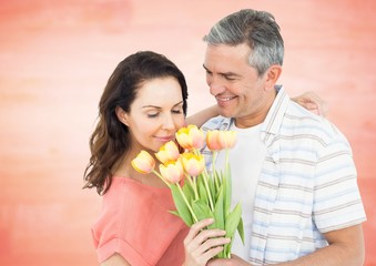 Fototapeta na wymiar Romantic couple smelling roses