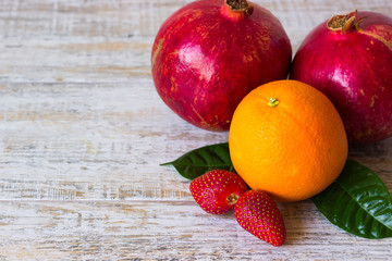 Fruits and berries on light background