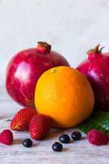 Fruits and berries on a light background