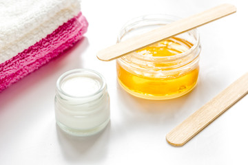 wax for depilation on white background