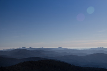 Fototapeta premium Foggy Sunrise in the Mountains