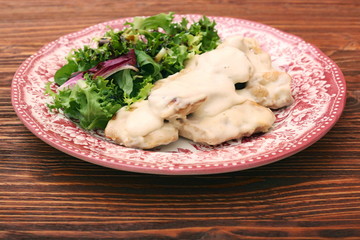 Chicken breast with cream sauce and green