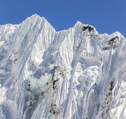 Fragment of the snow ridge in the massif of wall Nuptse from slope of Kala Patthar - Everest region, Nepal - obrazy, fototapety, plakaty
