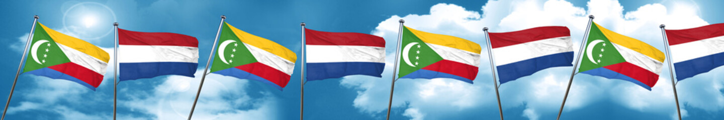Fototapeta na wymiar Comoros flag with Netherlands flag, 3D rendering