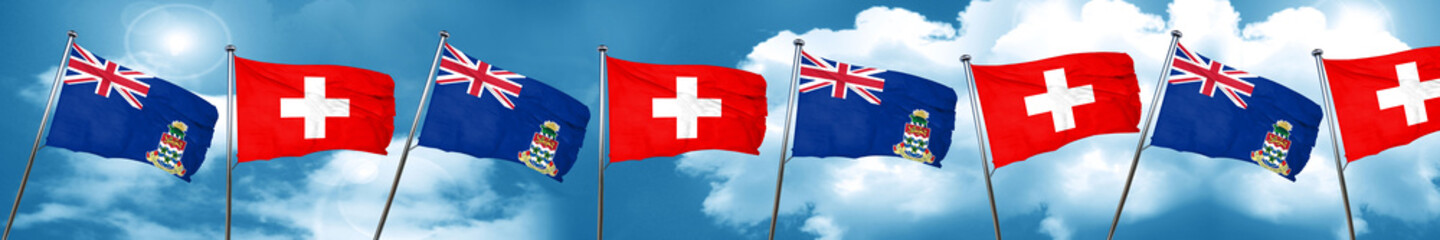 cayman islands flag with Switzerland flag, 3D rendering