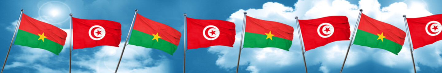 Fototapeta na wymiar Burkina Faso flag with Tunisia flag, 3D rendering