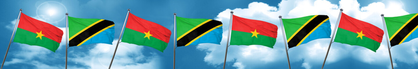 Burkina Faso flag with Tanzania flag, 3D rendering