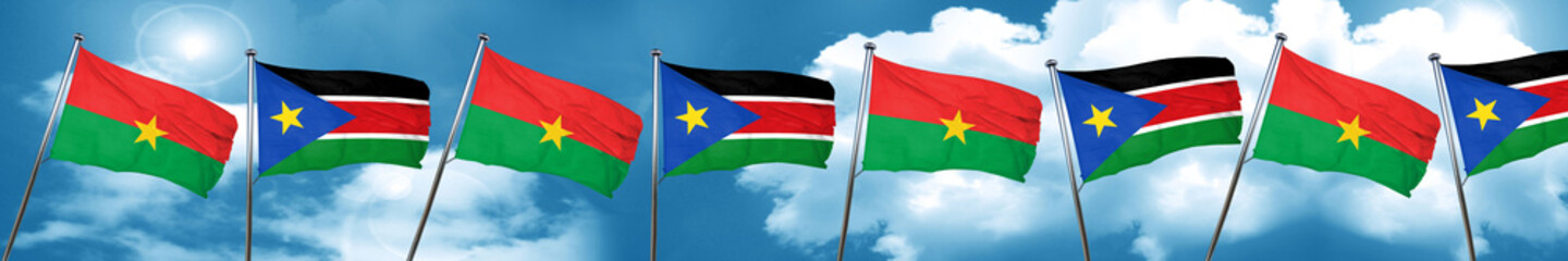 Fototapeta na wymiar Burkina Faso flag with South Sudan flag, 3D rendering