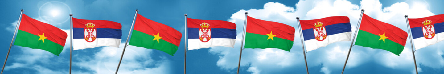 Fototapeta na wymiar Burkina Faso flag with Serbia flag, 3D rendering
