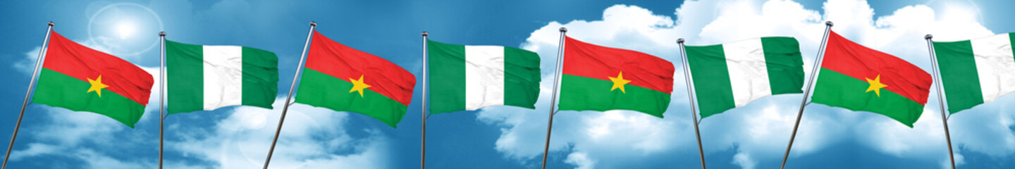 Fototapeta na wymiar Burkina Faso flag with Nigeria flag, 3D rendering