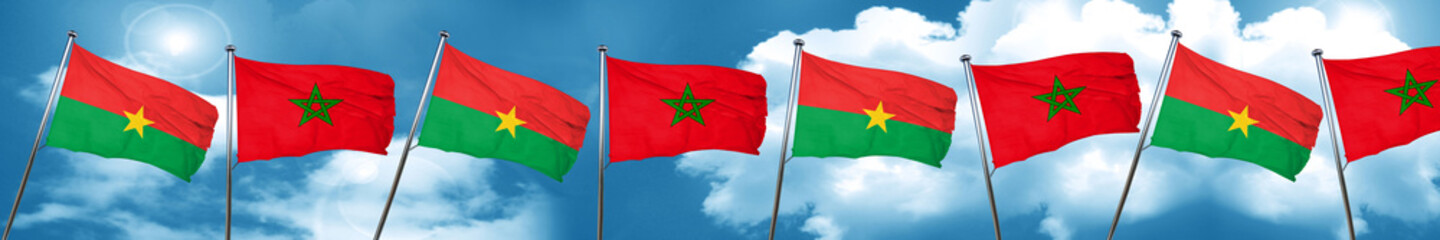 Burkina Faso flag with Morocco flag, 3D rendering