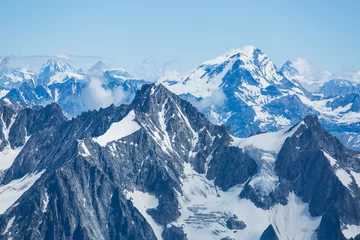 Foto op Plexiglas IJs, sneeuw en gletsjers klampen zich vast aan de flanken van de Mont Blanc in de Franse Alpen © Jeremy Francis