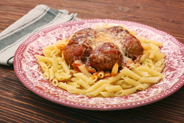 Meatballs with pasta on the plate