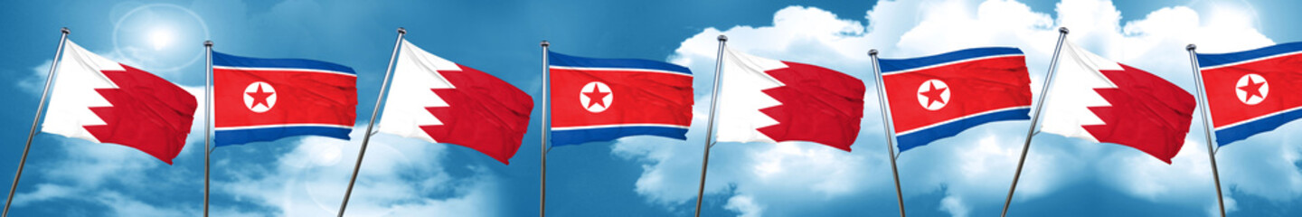 Fototapeta na wymiar Bahrain flag with North Korea flag, 3D rendering