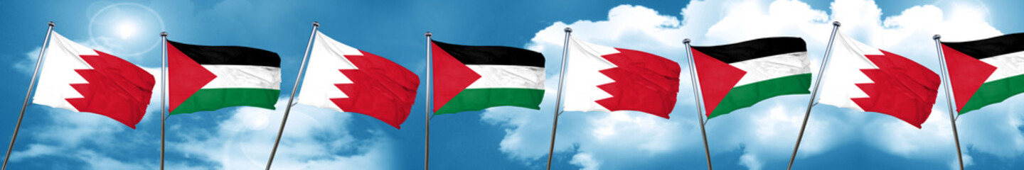Naklejka na ściany i meble Bahrain flag with Palestine flag, 3D rendering