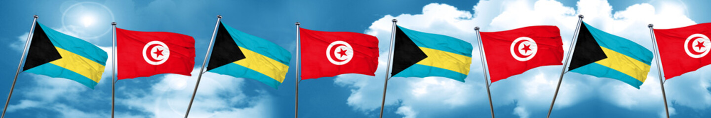 Bahamas flag with Tunisia flag, 3D rendering